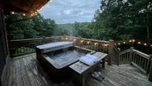 Private sunken hot tub with steam on a clean cabin deck, one of the getaway cabins near me in the Shenandoah Valley