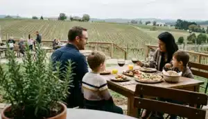 Family dining on a vineyard terrace during a family vacation in the Shenandoah Valley