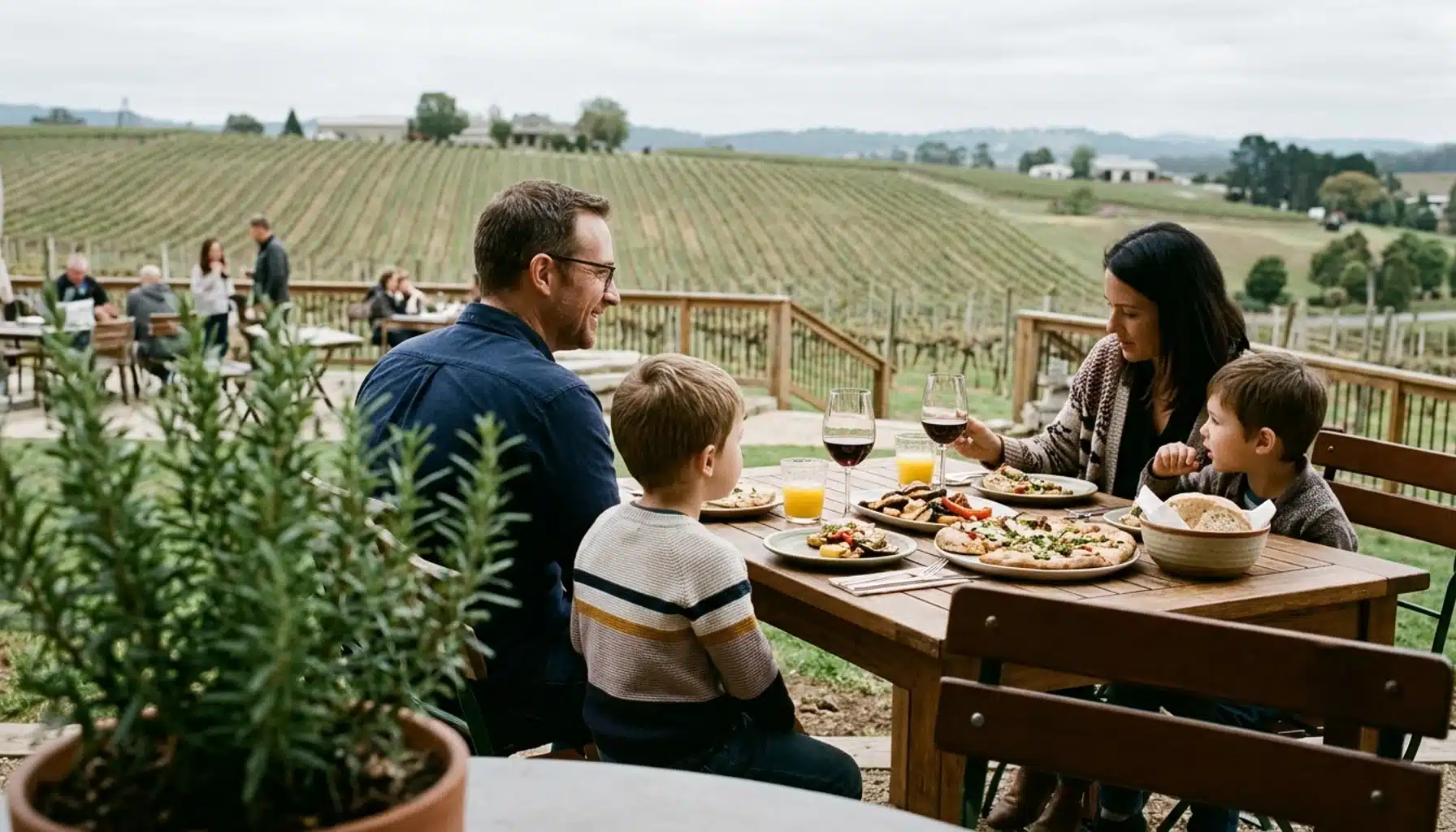 Family dining on a vineyard terrace during a family vacation in the Shenandoah Valley